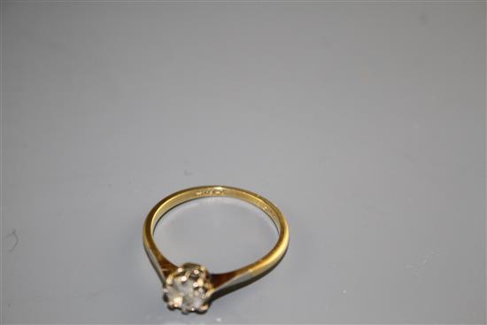 An 18ct and Pt. solitaire diamond ring, size R, gross weight 2.2 grams,